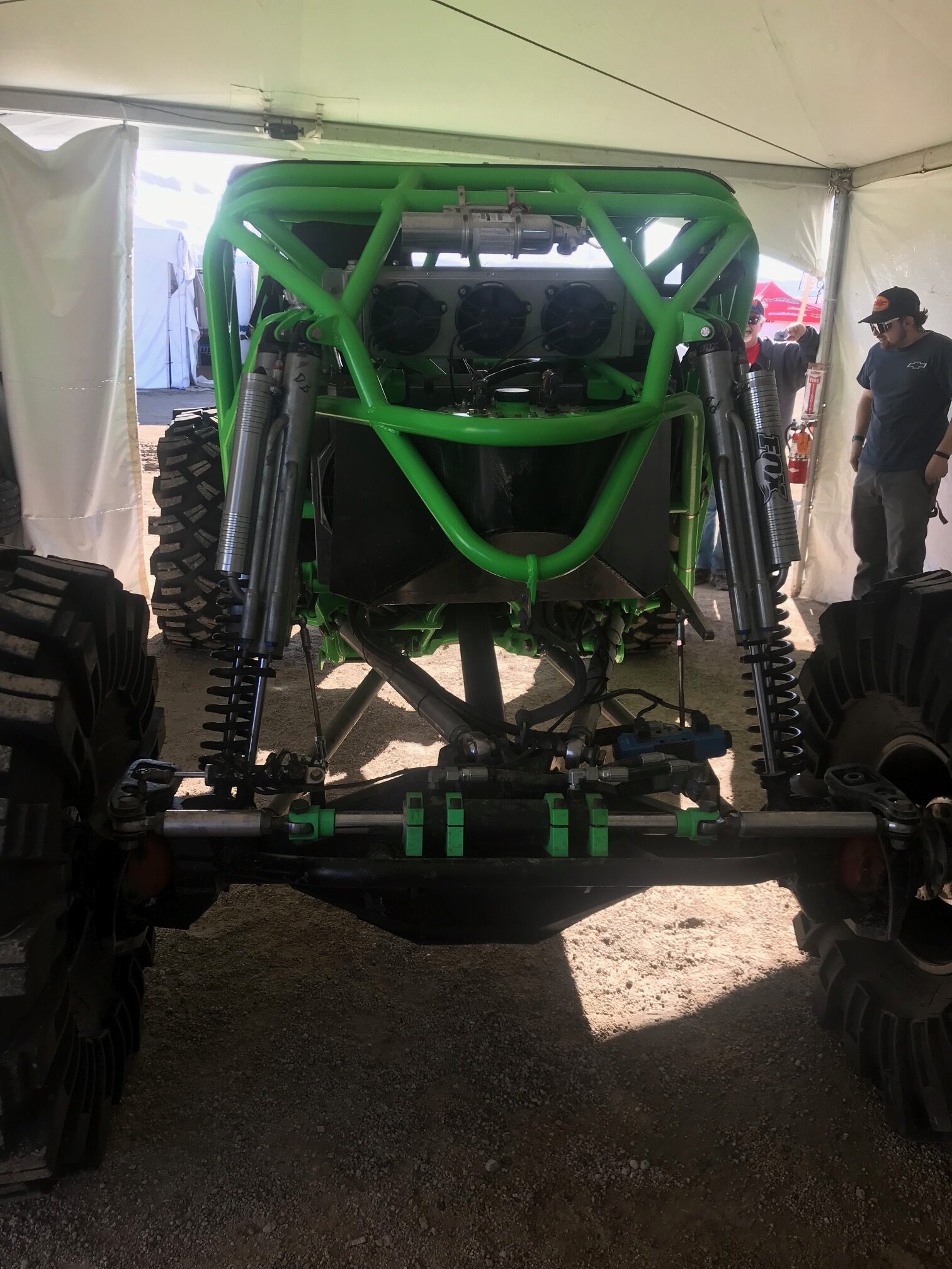Ultra4 vehicle rear end showing cage structure solid rear axle and Fox suspension at King of the Hammers