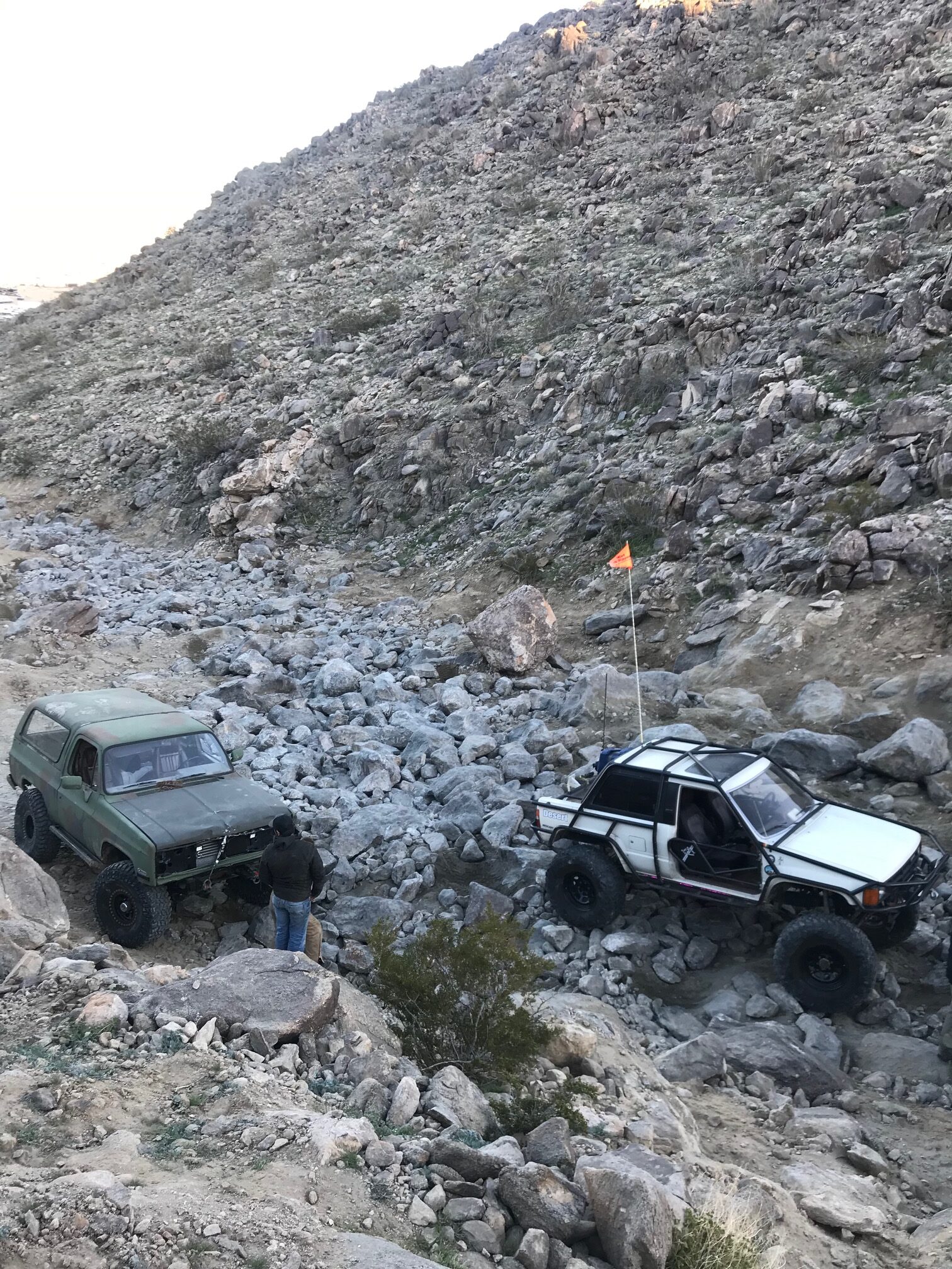 Off-road vehicles on rocky trail at King of the Hammers Johnson Valley California